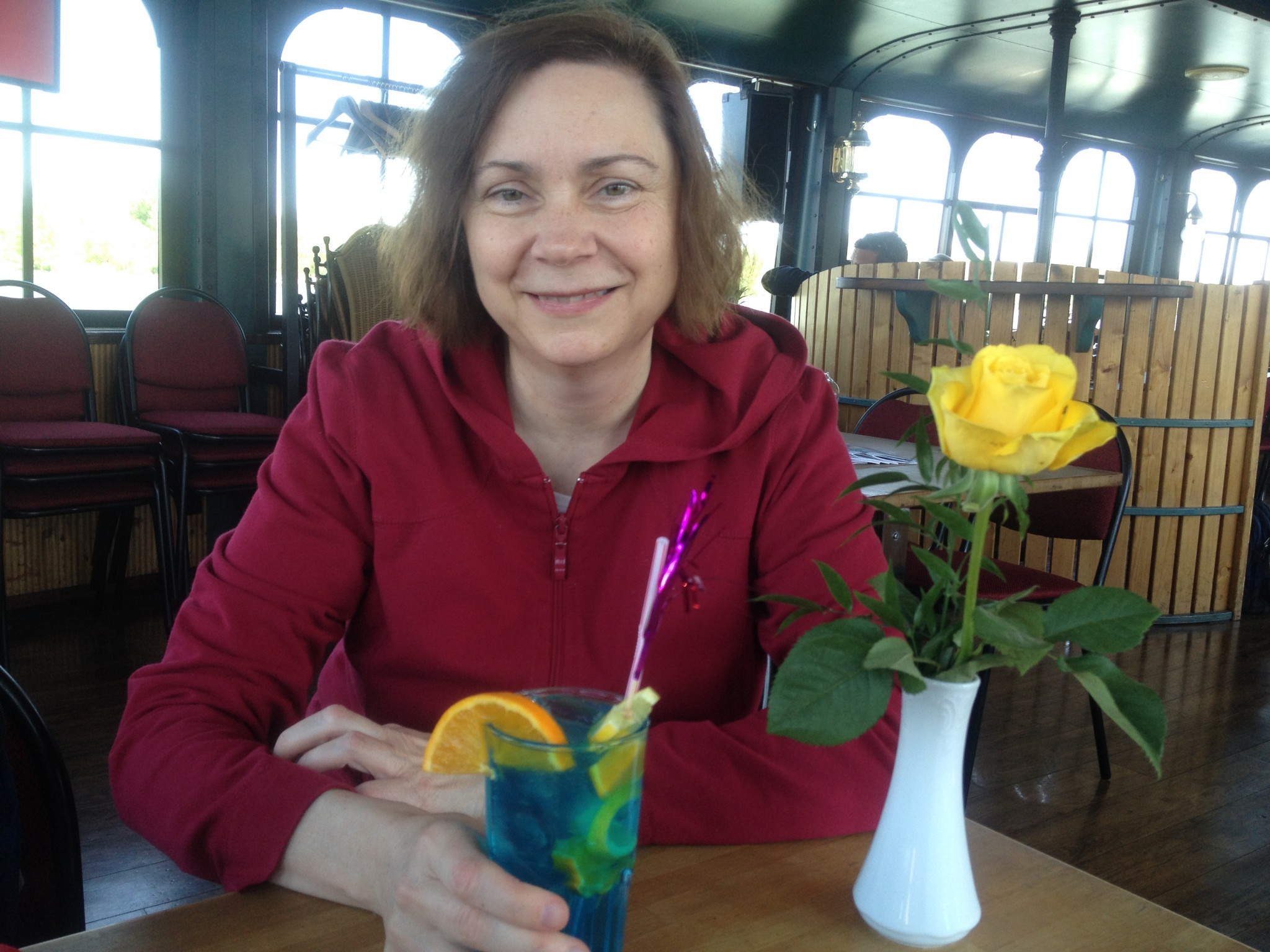Adriane enjoying Blue Danube drink on the blue Danube river cruise. 